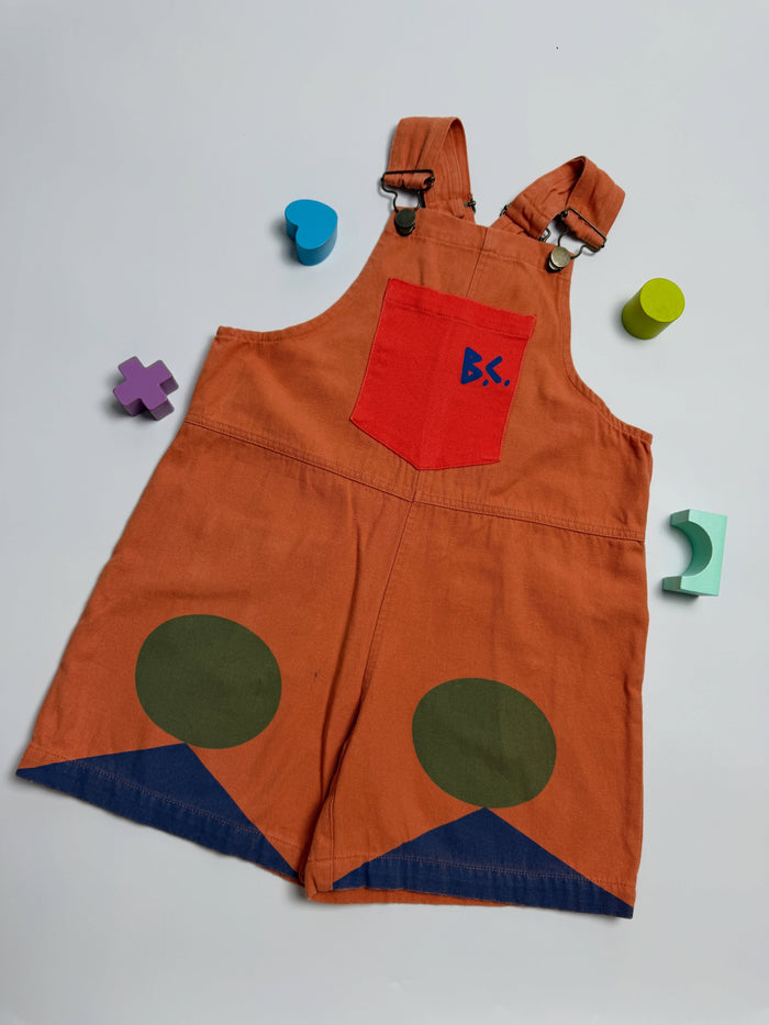 Colorful vintage-style orange short overalls