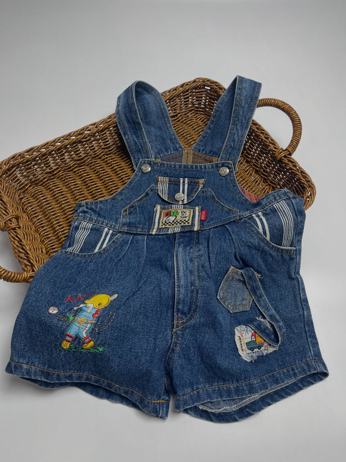 Vintage kid’s short overalls with colorful embroidered details, denim