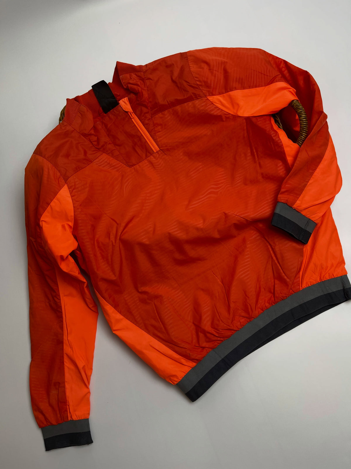 Orange lightweight hooded windbreaker