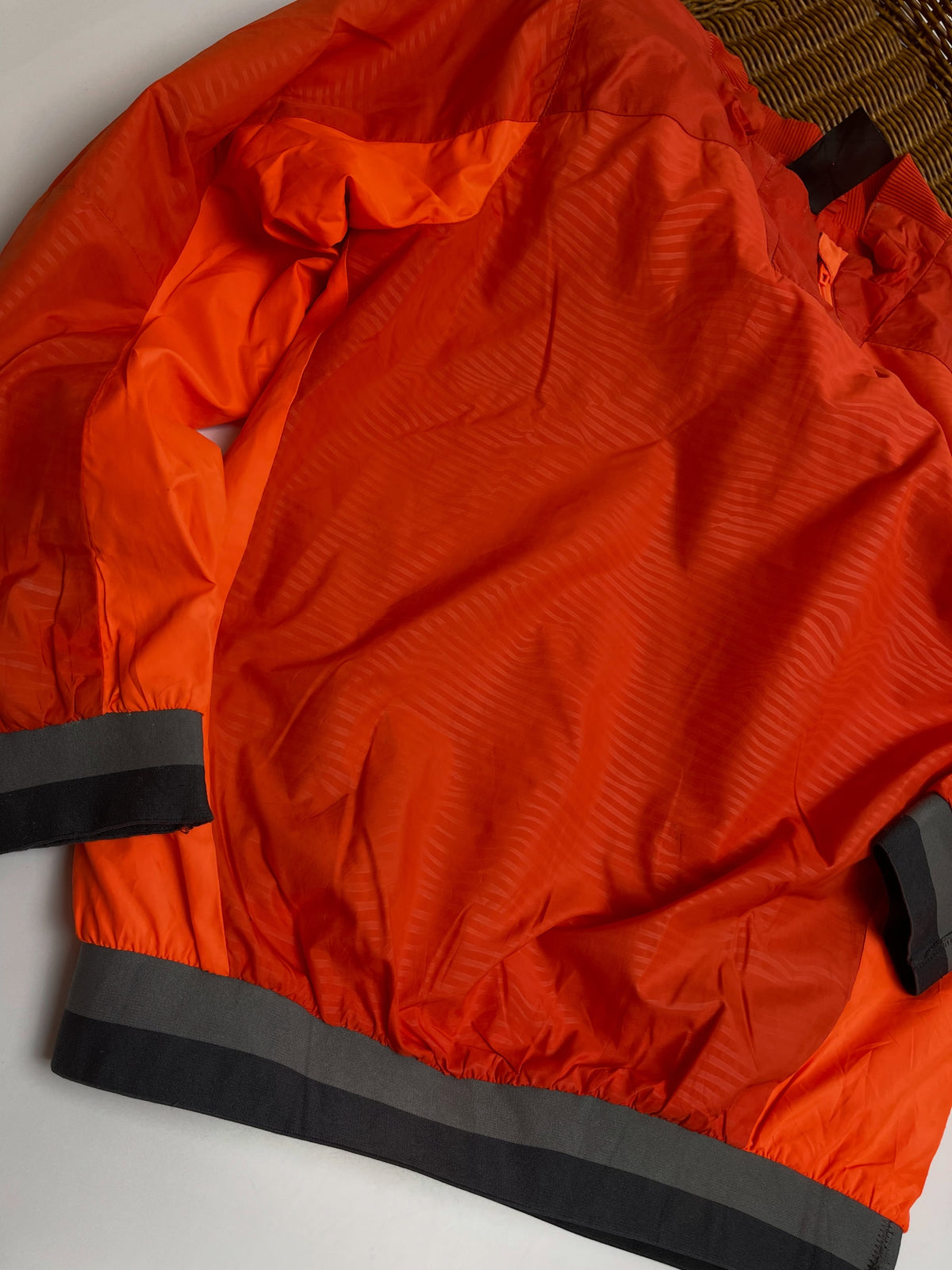 Orange lightweight hooded windbreaker
