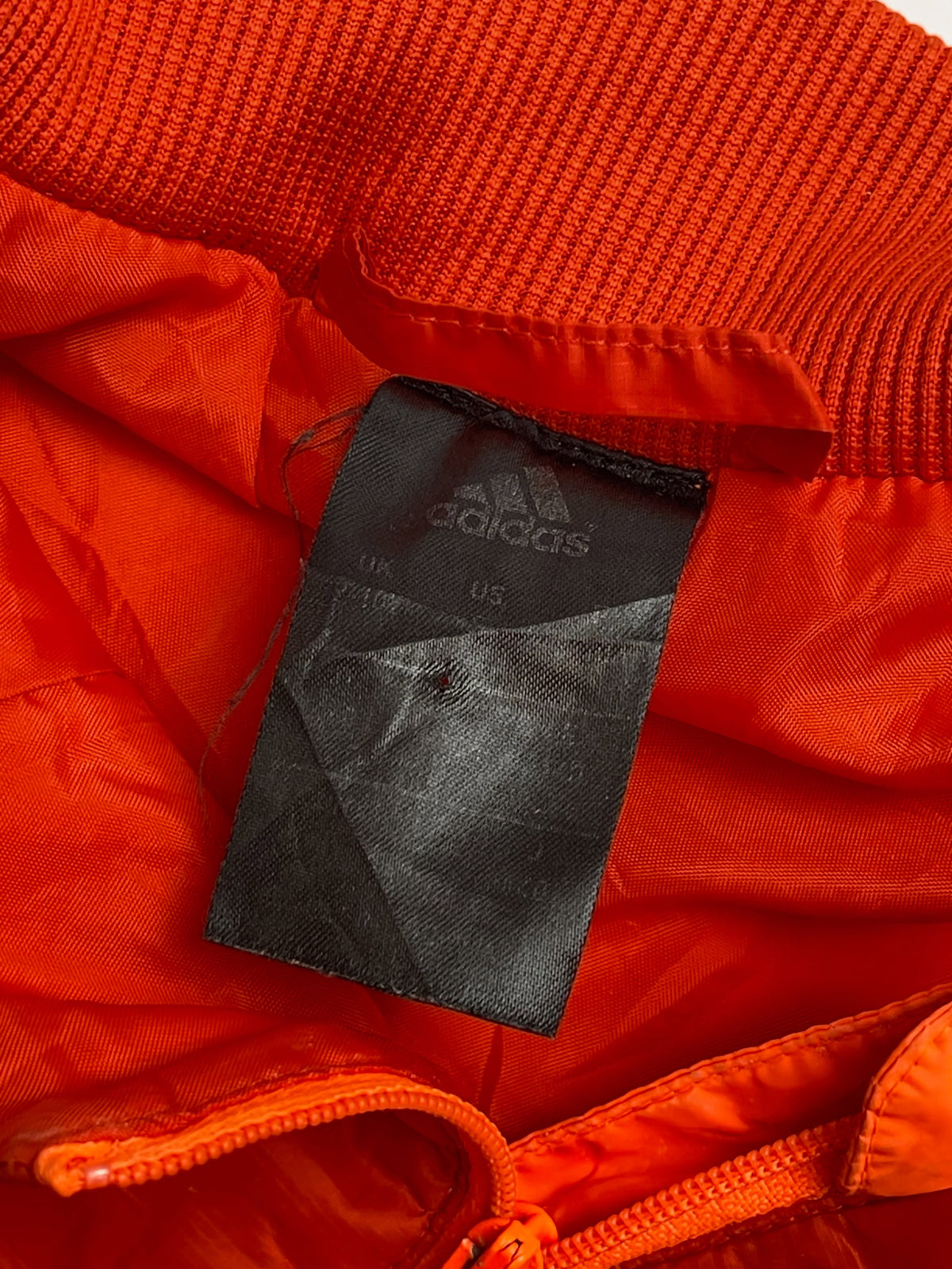 Orange lightweight hooded windbreaker
