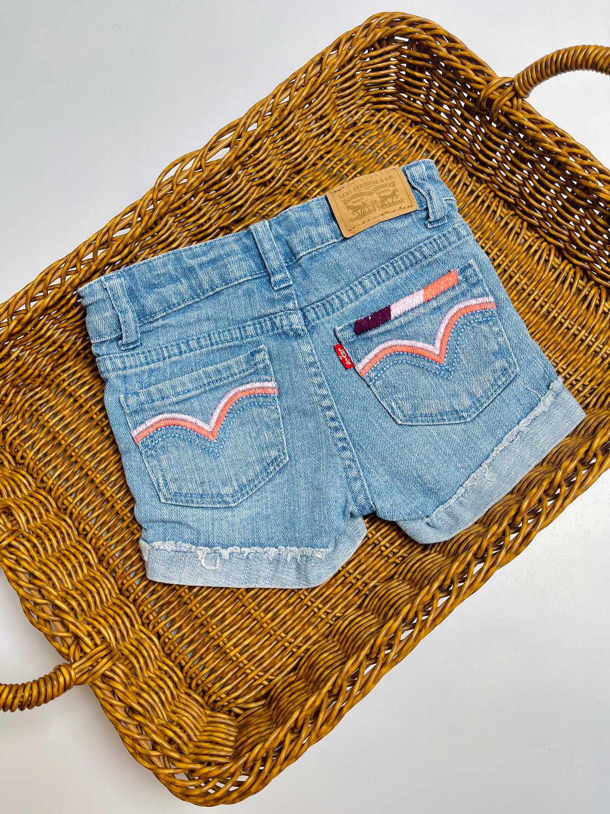 Levi’s Light Wash Distressed Denim Shorts