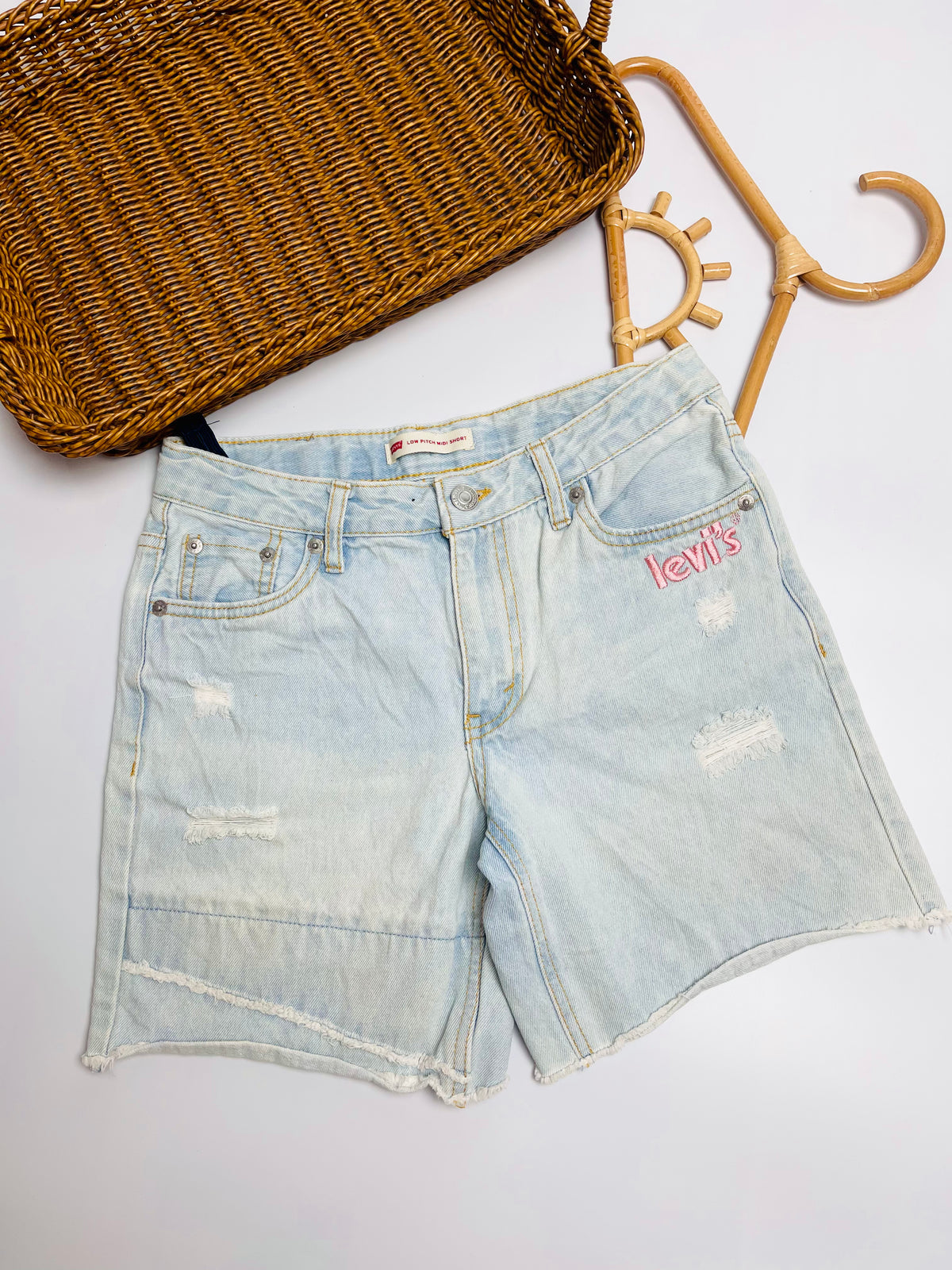 Levi’s Light Wash Distressed Denim Shorts